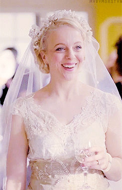 mvrymorstvn:

sherlock meme | seven outfits [4/7] 
↳ mary’s wedding dress

I was really surprised to hear that they didn&rsquo;t tell Amanda Abbington Mary&rsquo;s whole story when they filmed this episode. Really, really surprised. For a few reasons: I didn&rsquo;t realize they didn&rsquo;t read all three scripts before they started shooting (hahahahahaha I should have known they&rsquo;d still be working on the finer details up until the last second, no one&rsquo;s ever as organized as they should be, are they), and also because the decision smacks of a lack of trust. If you wanted Mary as her disguise instead of Mary with her very dark side visible, couldn&rsquo;t you just tell the actor that that&rsquo;s what you want? Amanda Abbington knows what she&rsquo;s doing. She&rsquo;s smart, she&rsquo;s competent. She&rsquo;s an excellent actor. Why not trust her?
Just now, seeing these gifs, I think I get it. Keeping something like that from an actor, potentially alienating a cast member and presumably a friend in this way, they must have wanted something very particular from her. What did they want?
They wanted no suggestion whatsoever of what Mary would do, surely. Not even the slightest hint of a whisper of what she really is. They wanted the truth of her so buried that it doesn&rsquo;t even exist here at all. They didn&rsquo;t want to show Mary pretending to be what John thinks she is; they wanted her to be that Mary. They wanted her eyes clear and unconcerned. No doubts, no concerns, no faltering, no mistakes. Not a hair out of place, not a questionable stray glance.
That&rsquo;s not something normal people can do, entirely subsume themselves, hide their goals and motivations out of every flicker and every movement. No one&rsquo;s that perfect. It would have been a weird thing to ask for, if she&rsquo;d known the truth. It would have seemed terribly fake. She would have wanted to play a woman hiding a terrible secret, naturally. Even just a little bit, when no one was watching. Because that&rsquo;s what she is. But they didn&rsquo;t want that, obviously.
Why not? Why would they want absolutely nothing of what Mary really is to be visible to the viewer, even in retrospect? There&rsquo;s something intensely satisfying in seeing hints of the future in the past, once you know what happens. Why did they disallow us that pleasure?
What we got must be exactly what they wanted. This must be Mary in perfect, perfect control. Her eyes, her face, her emotions: she is perfectly in check. Every move she makes is a decision, and it&rsquo;s always the right one. There is no darkness in her here, though she has plenty of that, as we later learn. She is not haunted, or conflicted, or distressed by her lies and manipulation. She is so perfectly not who she actually is that we have to question everything we see here. This is not Mary (or whatever her real name is). This is what she wants everyone to see and to believe.
She is the consummate actor, the perfect sleeper agent. Sherlock can&rsquo;t see any of her secrets, except a hint that she might lie about a few little things (but who doesn&rsquo;t?). She sets off no red flags. She is lovely and funny and adorable, she is forgiving and understanding, she is unthreatening and unthreatened. She is kind and gentle and intelligent. She befriends everyone, including the viewer, and including Sherlock, as impossible as that has always been for John&rsquo;s girlfriends. But she manages it. She is the perfect manipulator, and no one can see it. She&rsquo;s so good, it&rsquo;s inconceivable. She can become whatever she wants completely and perfectly, and make everyone believe it.
Sherlock must wish he could be this good at pretending to be something he&rsquo;s not. He&rsquo;s pretty good at it, because most people genuinely believe he&rsquo;s a sociopath. But he isn&rsquo;t. Mary is.